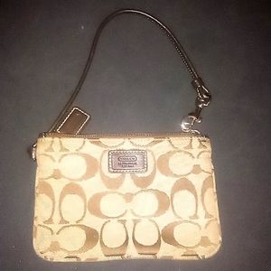 Brown vintage coach wristlet